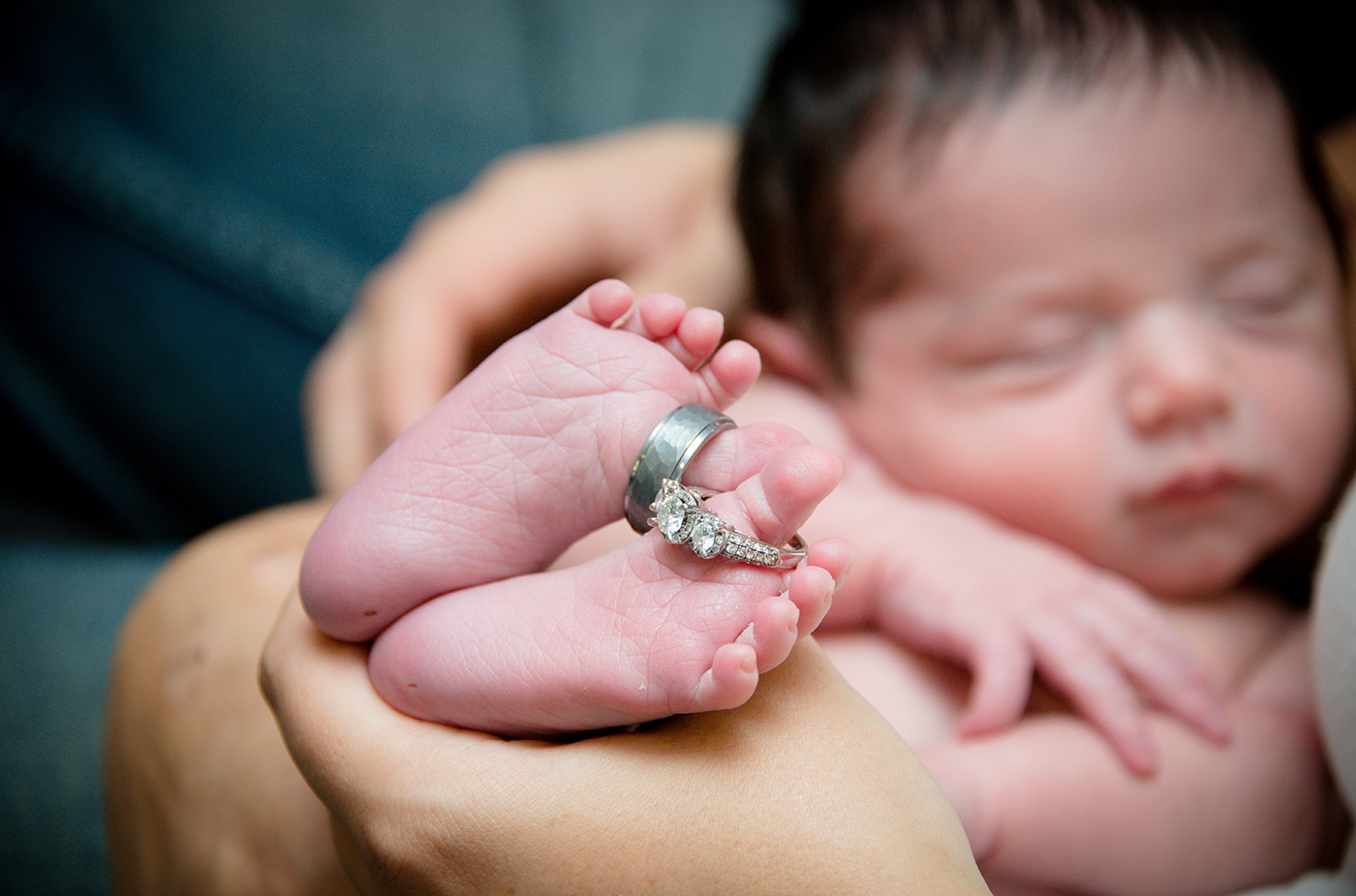 All Occasions Photography Albany NY - Newborn Photography Infant Holding Parent's Wedding Rings on Toes